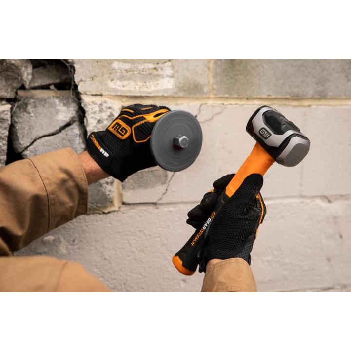 GEARWRENCH GWHFDRL48 being used by a person on a concrete wall