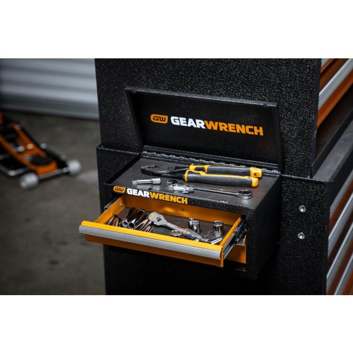 Image of the GWBXMINIS hanging of the side of a tool cabinet with its lid and drawers open showing tools inside of it