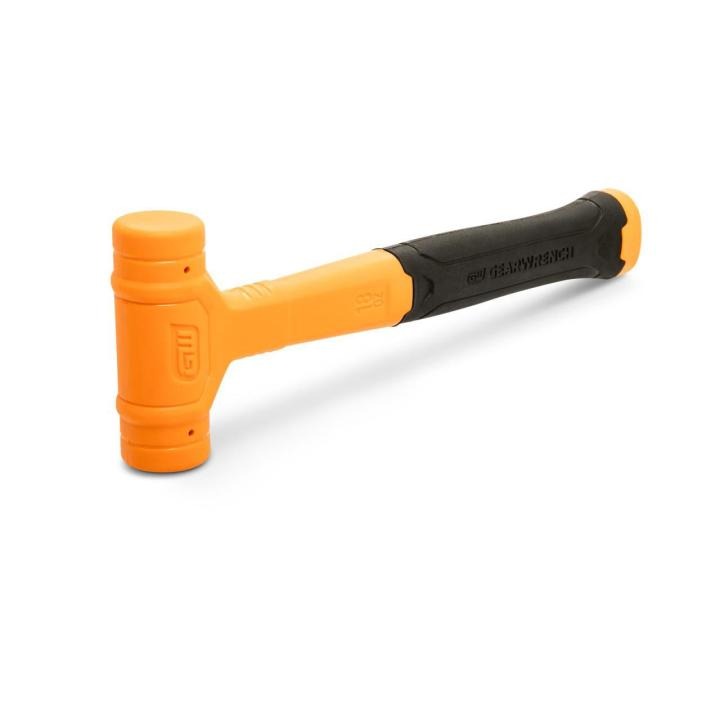 Image of the GEARWRENCH  18 oz. Dead Blow Hammer with the hammer resting on one of the heads and  the head on the left side and the black and molten colored handle towards the right