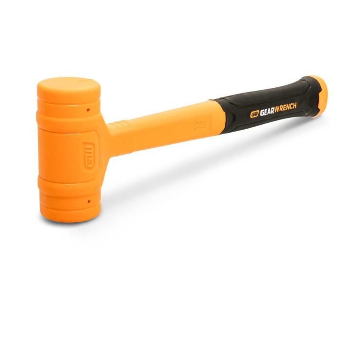 Image of the GEARWRENCH  32 oz. Dead Blow Hammer with the hammer resting on one of the heads and  the head on the left side and the black and molten colored handle towards the right