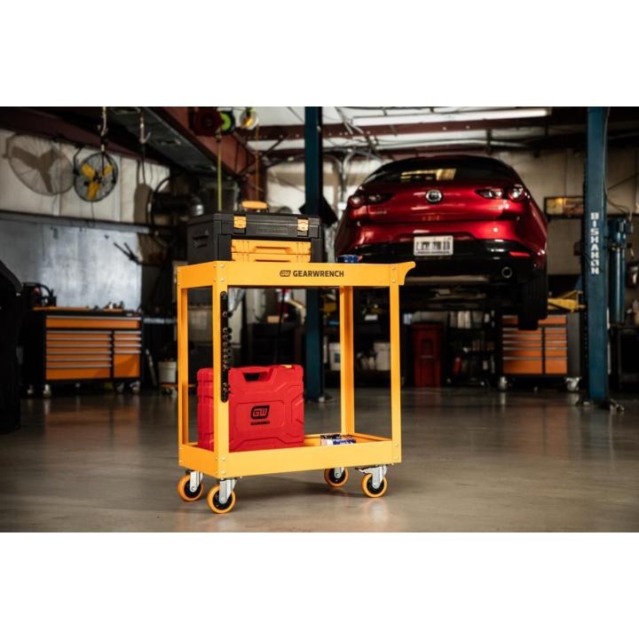 Image of the Molten Orange GWMSC Metal Utility Cart in a garage shop with various tool case equipment on the cart.