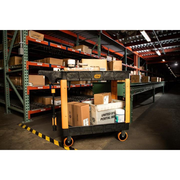 Image of the GWPSCS Heavy Duty Utility Cart in a warehouse setting showing the cart with packages on it.